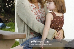 UNITED STATES - AUGUST 22:  Kate Winslet holds Sadie Goldstein on the set of the movie, "Little Children," which is being filmed in Walker Street Park on Staten Island. Winslet plays a young mother and Goldstein is her daughter in the film.  (Photo by Richard Corkery/NY Daily News Archive via Getty Images)